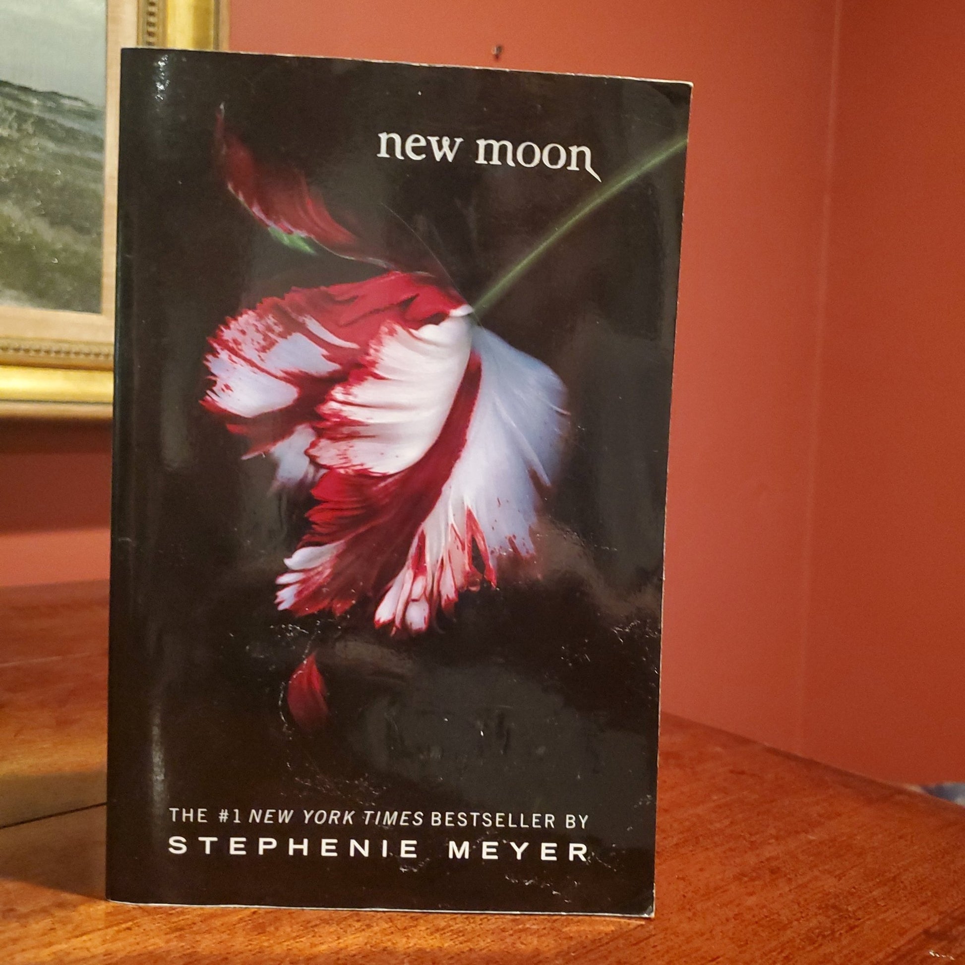 New Moon - [ash-ling] Booksellers