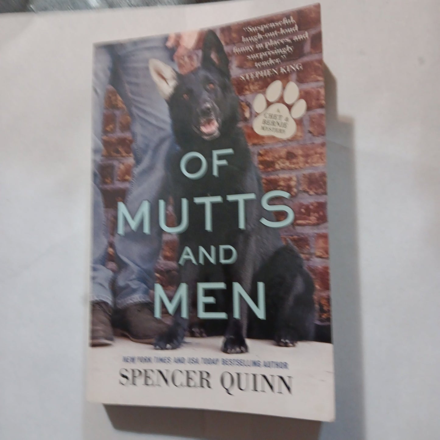 Of Mutts and Men - [ash-ling] Booksellers