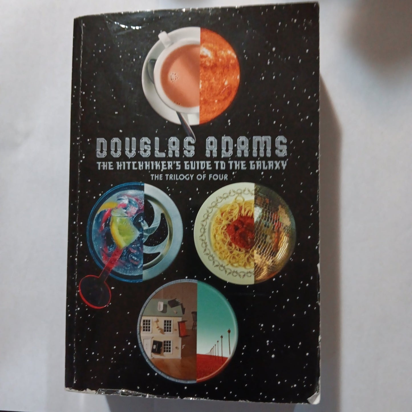 The Hitchhiker's Guide to the Galaxy - [ash-ling] Booksellers