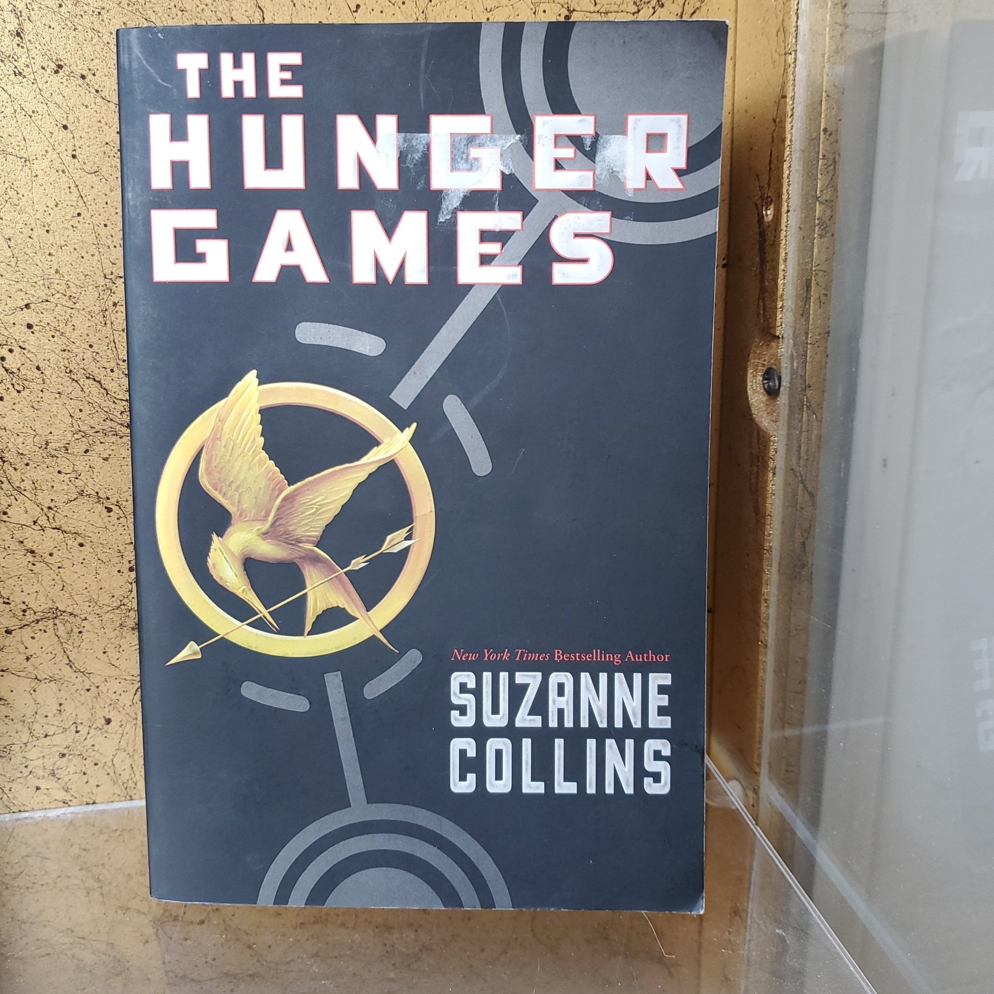 The Hunger Games - [ash-ling] Booksellers