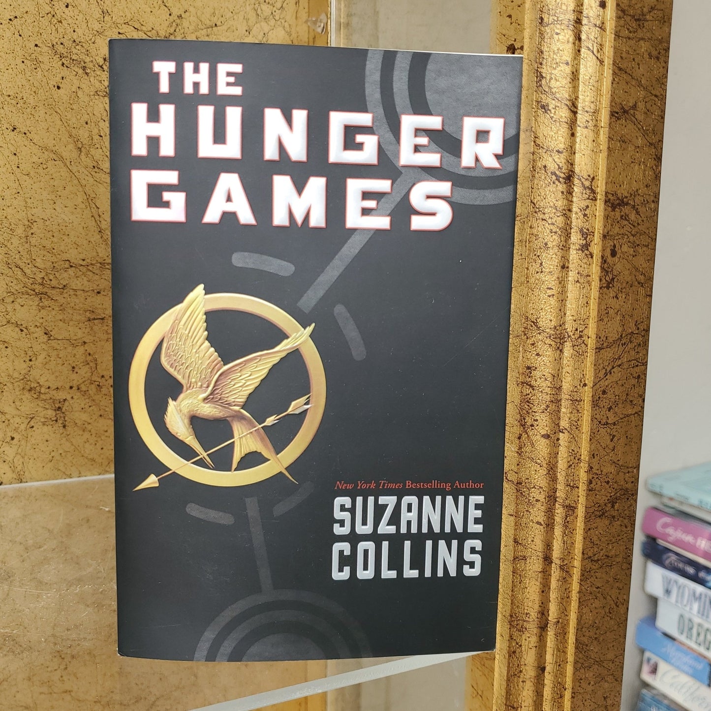 The Hunger Games - [ash-ling] Booksellers