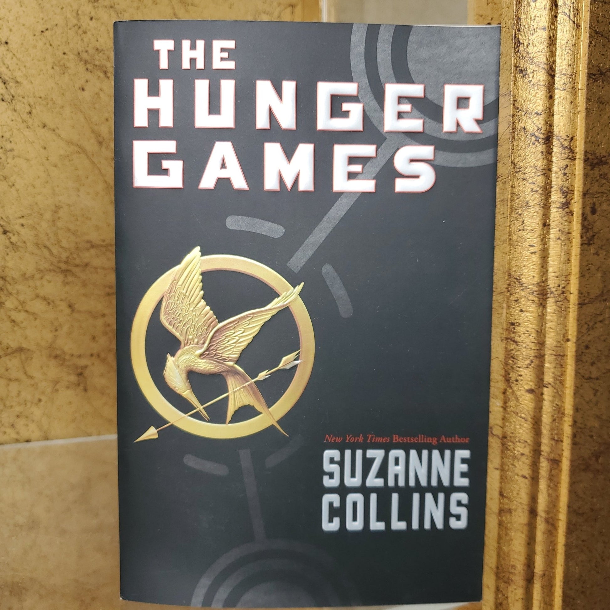 The Hunger Games - [ash-ling] Booksellers
