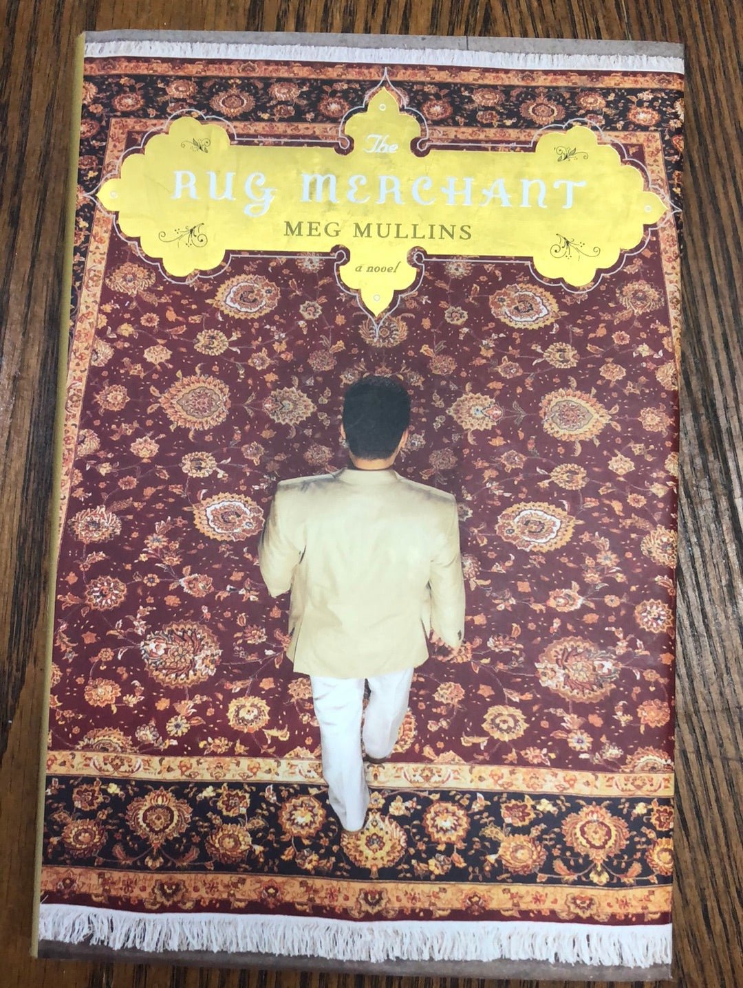 The Rug Merchant - [ash-ling] Booksellers