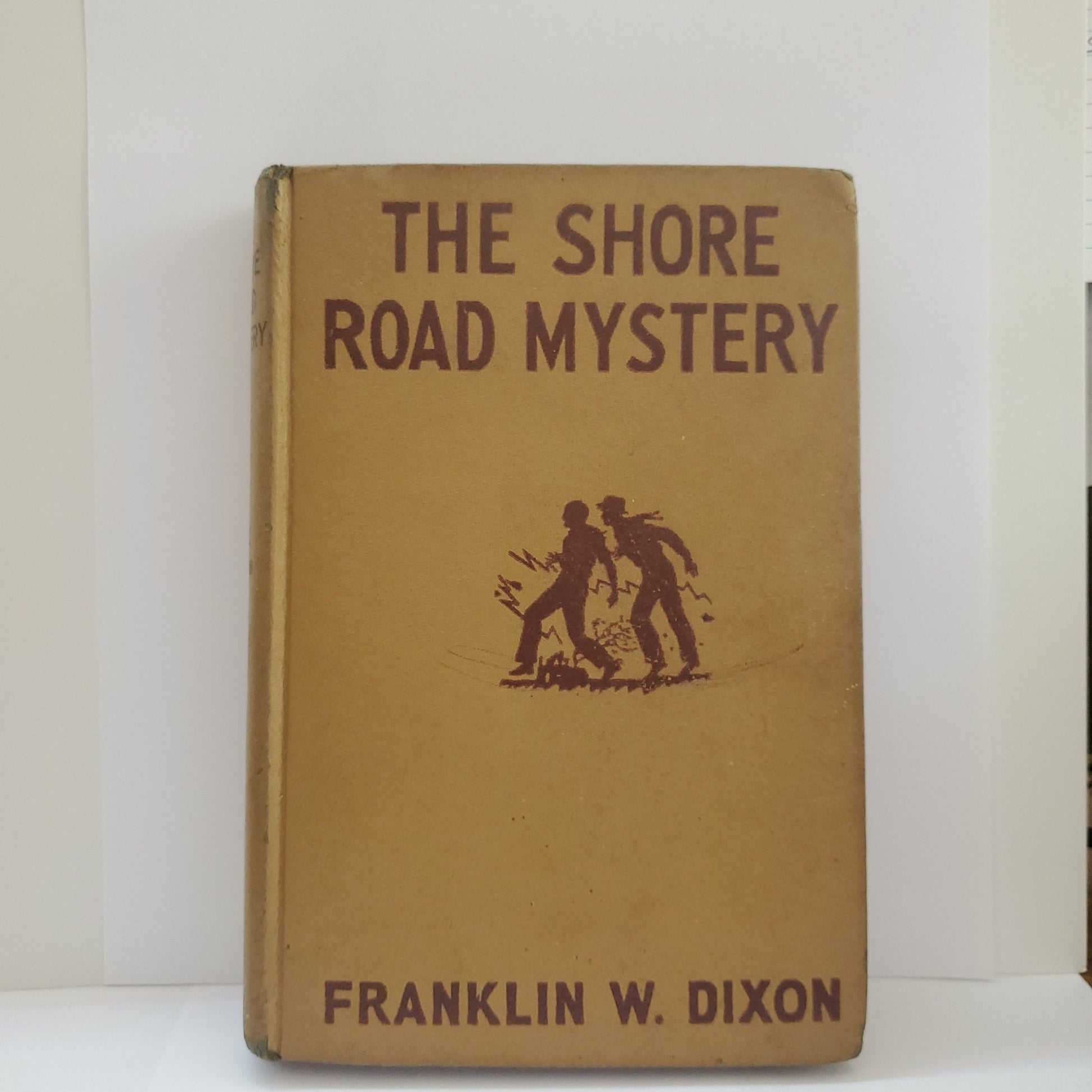 The Shore Road Mystery - [ash-ling] Booksellers